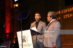 NEW YORK, NEW YORK - NOVEMBER 13: Ram?n Rodr?guez (L) and Luis Guzm?n speak onstage at the 11th Annual Cristian Rivera Foundation Celebrity Gala on November 13, 2019 in New York City. (Photo by Johnny Nunez/WireImage)