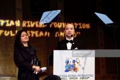 NEW YORK, NEW YORK - NOVEMBER 13: Honorees Sansan Harashima (L) and Hide Harashima speak onstage at the 11th Annual Cristian Rivera Foundation Celebrity Gala on November 13, 2019 in New York City. (Photo by Johnny Nunez/WireImage)